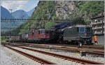 Green and red Re 4/4 II arount the C 5/6 2987 in Bodio.
28.07.2016