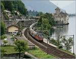 The SBB Re 420 245-3 with a Cargo train by the Castle of Chillon.