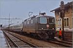 The SBB Re 4/4 II 11232 wiht the Hispania Express (Port-Bou-Basel) and EC Mont-Blanc (Genève - Hamburg) by his stop in Delémont.

16.09.1984