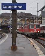 The SBB Re 4/4 II 11256 (Re 420 256-0) and an other one in Lausanne.