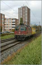 Re 4/4 II 11365 with a mini-mail train by Grenchen.