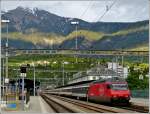 A IR to Geneva is leaving the station of Brig on May 22nd, 2012.