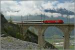 SBB Re 460 with an IC of the Luegelkinn-Viaduct.
04.05.2013