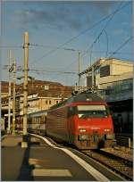 The SBB Re 460 005-2 wiht the EC 37 to Venezia by the stop in Lausanne.