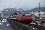 SBB Re 460 000-3 with an IR to Brig in Aigle. 
02.02.2015