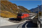 SBB Re 460 114-2 with an IR by Leuk.
26.10.2015