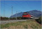 The SBB Re 460 005-5 with an IR to Brig near Bex.