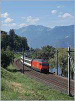 The SBB Re 460 079-7 with an IR90 to Geneva Airport near Villeneuve.