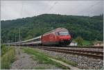 A SBB Re 460  with his IR 90 on the way to Geneva by St-Maurice. 

14.05.2020