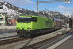 Coming from Spiez, BLS 465 018 hauls the Golden Pass Panoramic Express dual-gauge train set into Zweisimmen on 1 January 2024.