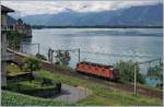 A SBB Re 6/6 by the Castle of Chillon.