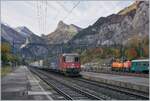 The SBB Re 6/6 11633 (Re 620 033-1)  Muri  and the Re4/4 II 11335 wiht a Cargo Train in Kandersteg. 

11.10.2022  