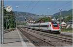 The SBB ICN RABe 500 041-0 and an other one on the way from Biel/Bienne to Basel in Moutier.