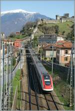 ICN to Lugano just after the departure from Bellinzona Station. 
21.03.2011