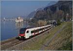 A SBB RABe 523 (Flirt 3) by the Castle of Chillon on the way to Aigle.