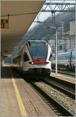 TILO Flirt to Castione Arbedo is arriving at Como San Giovanni Station.