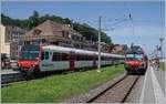 Region Alps local trains on te way to Brig and St Gingolph by his crossing in Bouveret. 

25.06.2019