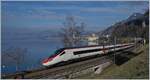 A SBB ETR 610 from Milano to Geneva by the Castle of Chillon.