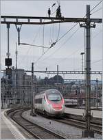 A SBB ETR 610 on thw way from Frankfurt to Milano is arriving at Luzern.