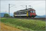 A solo RBe 4/4 is the local rush hour train from Palezieux to Romont; here by Oron, 10.08.2010
