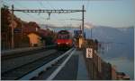 Re 460 117-5 wiht an IR on the way to Lausanne in St Saphorin.
01.03.2012