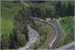 On the way on the Gotthard Railway - the journey of the IC 2 667, consisting of two SBB RABe 501  Twindexx  near Wassen in four pictures: The train enters the Wattinger curve through the Wattinger