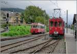 RhB ABe 4/4 N 35 and CEV BDeh 2/4 74 in Blonay. 
13.10.2012