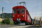 The RhB ABe 4/4 N 35 by the Blonay-Chamby on the way to Vevey by a stop in Blonay.