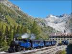 The DFB steam train photographed in Gletsch with the Rhone glacier in the background on September 16th, 2012.
