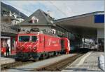 The MGB HGe 4/4 103 takes the Glacier Express in Disentis.