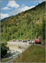 The Glacier Express 902 from Zermatt to Davos near Betten Talstation.