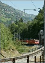 MGB HGe 4/4 wiht an Train to Zermatt is approching the St Niklaus Area.