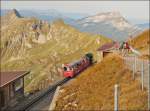 . A BRB steam train is arriving in Rothorn Kulm on September 28th, 2013.