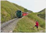 . The BRB steam enginge N 16 is pushing its train towards the summit station Rothorn Kulm on September 28th, 2013.