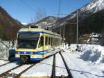 Out of a Vigezzo-Vision-Panoramic-Train I shoot this picture of train 54 leaving a station in the Valle Vigezzo. (March 2009)