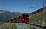 A new Jungfraubahn train, the Bhe 4/8 223 by the Eigergletscher Station.