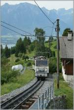 A Rochers de Naye train is approaching Les-Haut de Caux. 28.08.2012