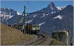 A MOB GDe 4/4 with his MOB Belle Epoque train from Zweisimmen to Montreux betwenn Senday-Sollard and Chamby.