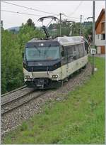 The MOB Ge 4/4 8004 with a MOB Panoramic Service from Zweisimmen to Montreux by Plancahmp.