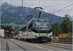 The MOB Ge 4/4 8001 with his IR 2523 from Zweisimmen to Montreux in Saanen.