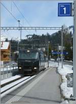 MOB Ge 4/4 with a Panoramic Express to Montreux is arriving at Saanenmsser. 
04.03.2011