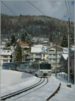 CEV Beh 2/4 N 72 and Beh 2/4 N 71 with Bt near Blonay Station.
08.02.2013