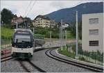 The CEV MVR GTW ABeh 2/6 7505 on the way to the Les Pléides is leaving the  new  St-Légier Gare Station.