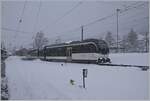 During heavy snowfall, a CEV MVR ABeh 2/6 leaves Blonay train station towards Les Pleiades.