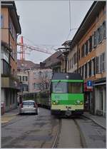 The A-L BDeh 4/4 412 with his train to the Aigle Station in the streets of Aigle.
07.01.2018