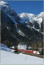 RhB Ge 4/4 III 652 with a RE ST Moritz - Chur by Bergn/Bravuogn.
16.03.2013