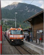 The RhB Ge 4/4 III 641 with a fast train from St Morizt to Chur in Filisur.