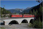 The Ge 6/6 II 707  Scuol  with an RhB Fast Train Service to St Morizt between Bergün and Preda.