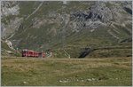 A Bernina local train between Bernina Lagalp and Ospizio.