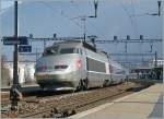 The  TGV de neige  9261 from Paris to Brig is arriving at Martigny Station.